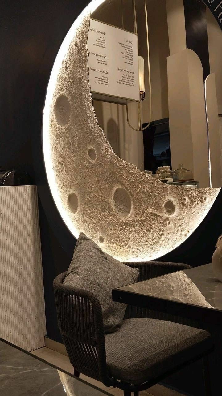 3D lunar wall art sculpture installed as feature wall in UAE master bedroom