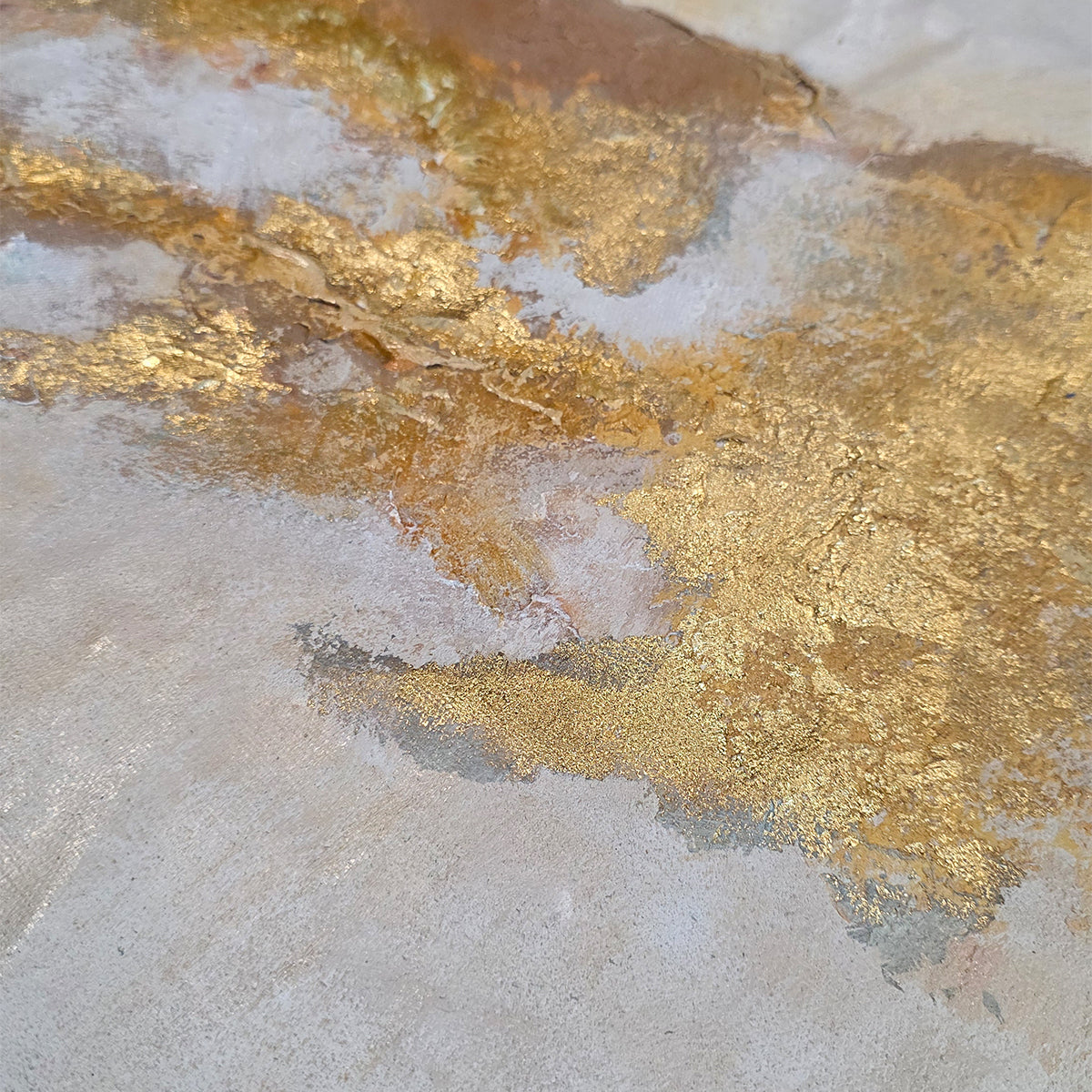 Close-up detail of a 100% handmade gold foil artwork with rich 3D textures and golden accents, perfect for a modern office or living room statement wall.