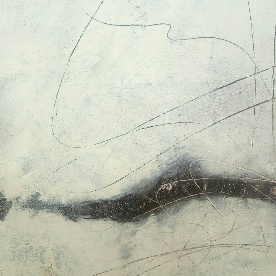 Detail of soft blush pink tones and fine metallic linear marks on a handmade abstract painting