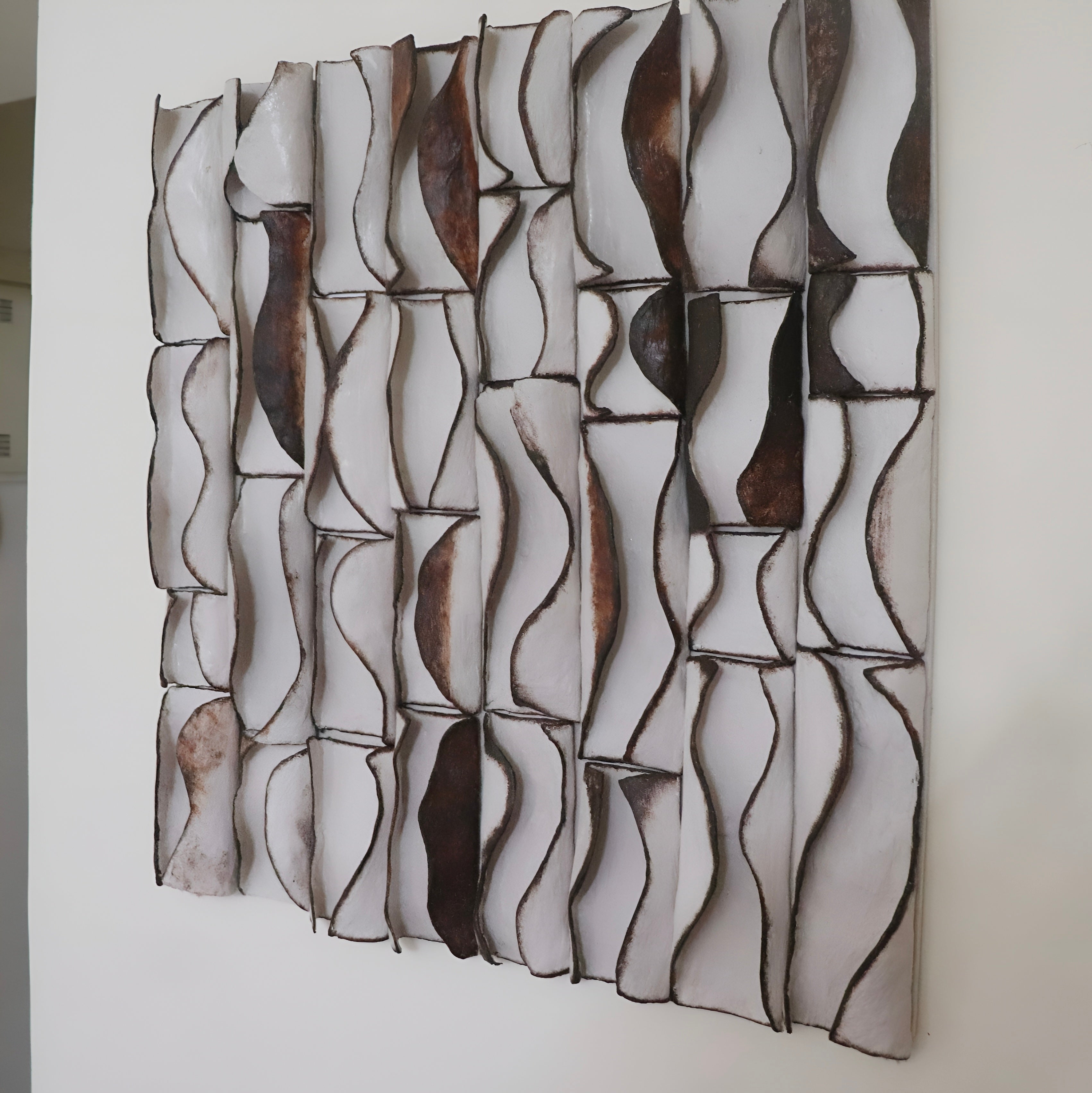 ceramic-wall-sculpture-shadow-depth-side-angle
