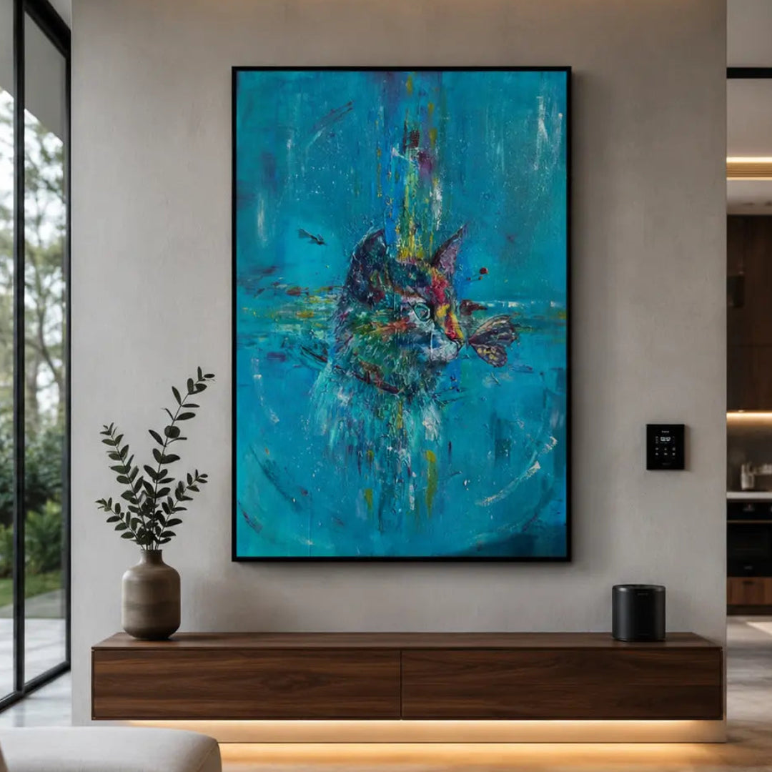Chloe original turquoise cat painting with a butterfly, shown as a styled room visualisation on a neutral wall in a modern villa living room