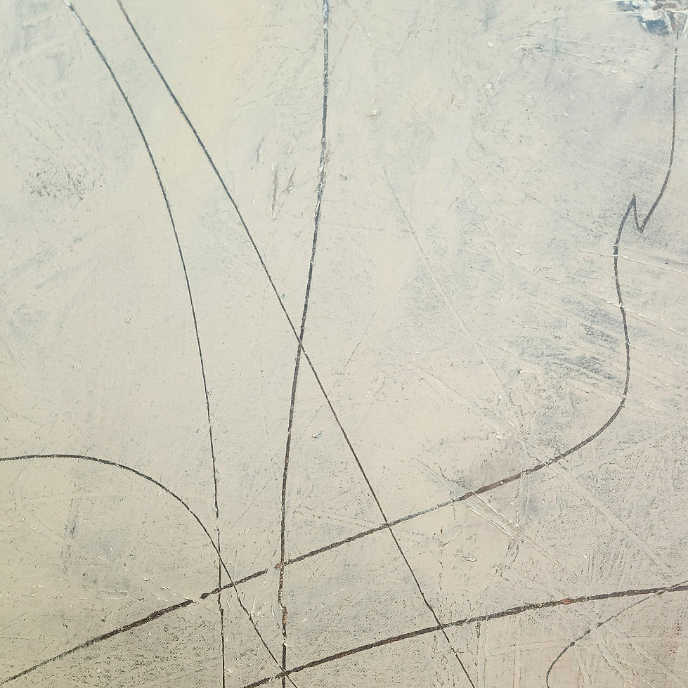Detail of scraped cream and pale blue brushwork on a textured acrylic abstract canvas