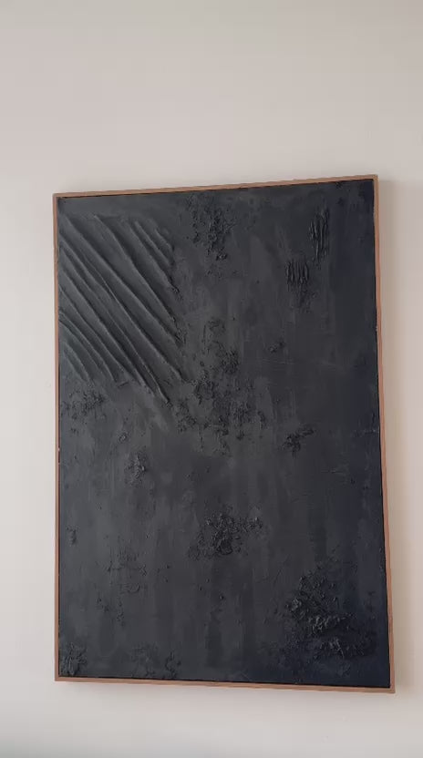 Close-up animation of handmade black textured abstract wall art showing layered matte oil texture 75x115 cm premium canvas for luxury United Arab Emirates interiors