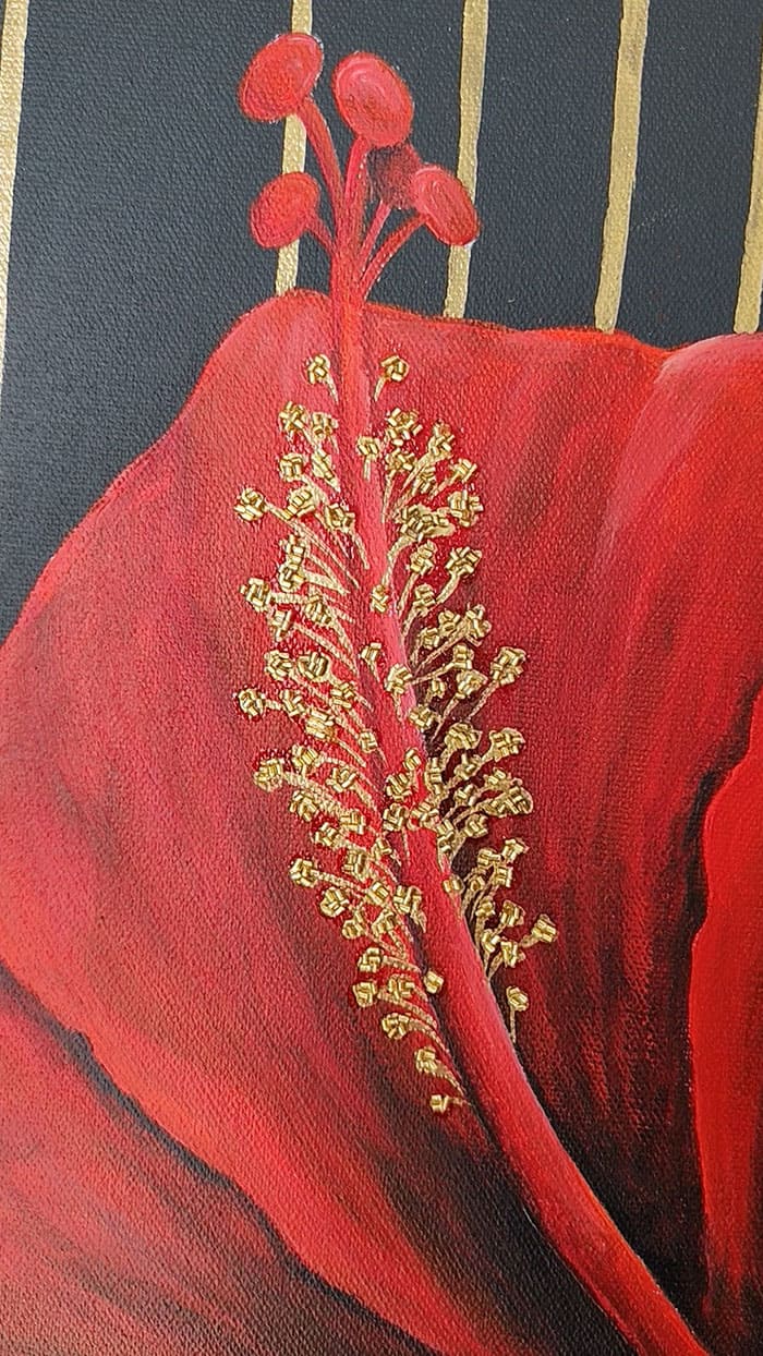 Watch Crimson Blossom up close — hand embroidery, gold beads, ruby detail, and bold crimson florals on a monochrome figurative canvas. 100% handmade by UAE artist Zainab Ghatwary. Available at Artecasso Dubai with free UAE delivery