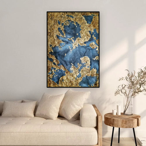 Hand-painted abstract oil painting with gold foil displayed on a dining room wall